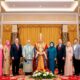 Agong With Nine Foreign Representatives In A Formal Setting.