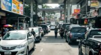 Malaysian Street With Fuel Stations And Cars Waiting.