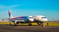 Malaysia Airlines Plane On Runway In Vietnam.