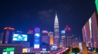 Kuala Lumpur Skyline At Night With Vibrant City Lights.